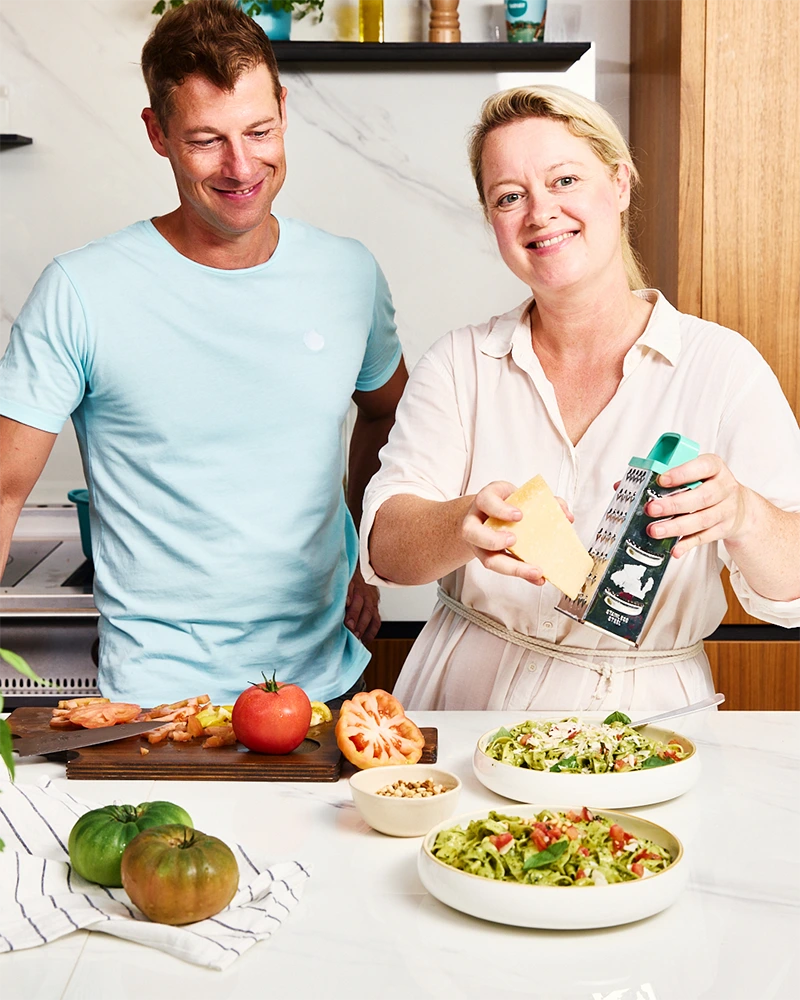 CEO Lieven Vanlommel and his wife Marijke Van Win cooking together, showcasing their passion for real food without additives.