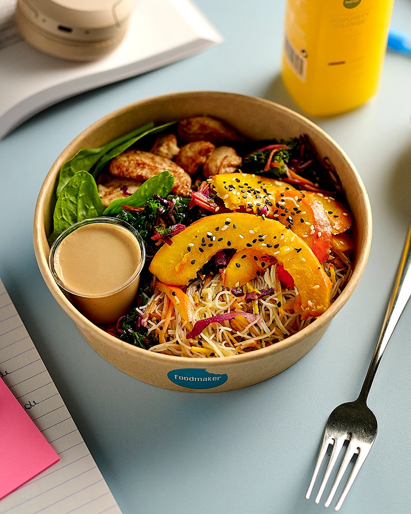 Student meal featuring a fresh food bowl and cold-pressed juice